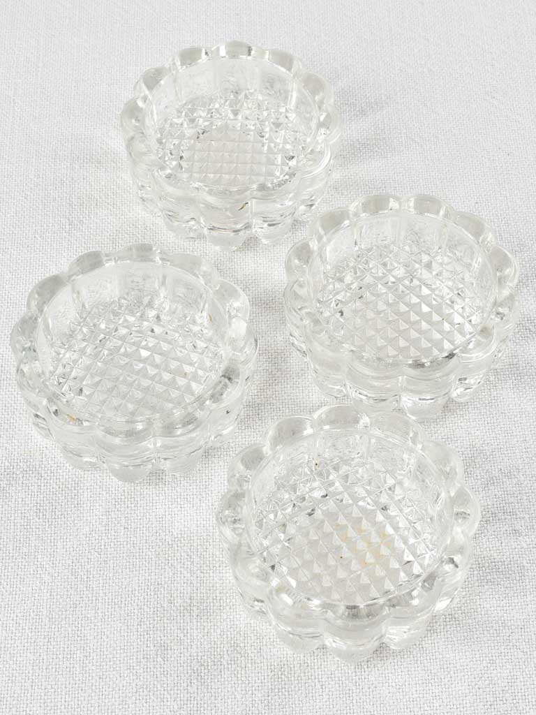Set of four vintage French glass table risers - small