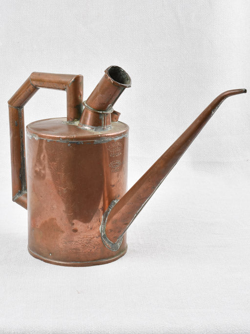 Small copper winemaker's watering can