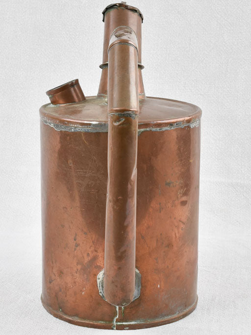 Small copper winemaker's watering can