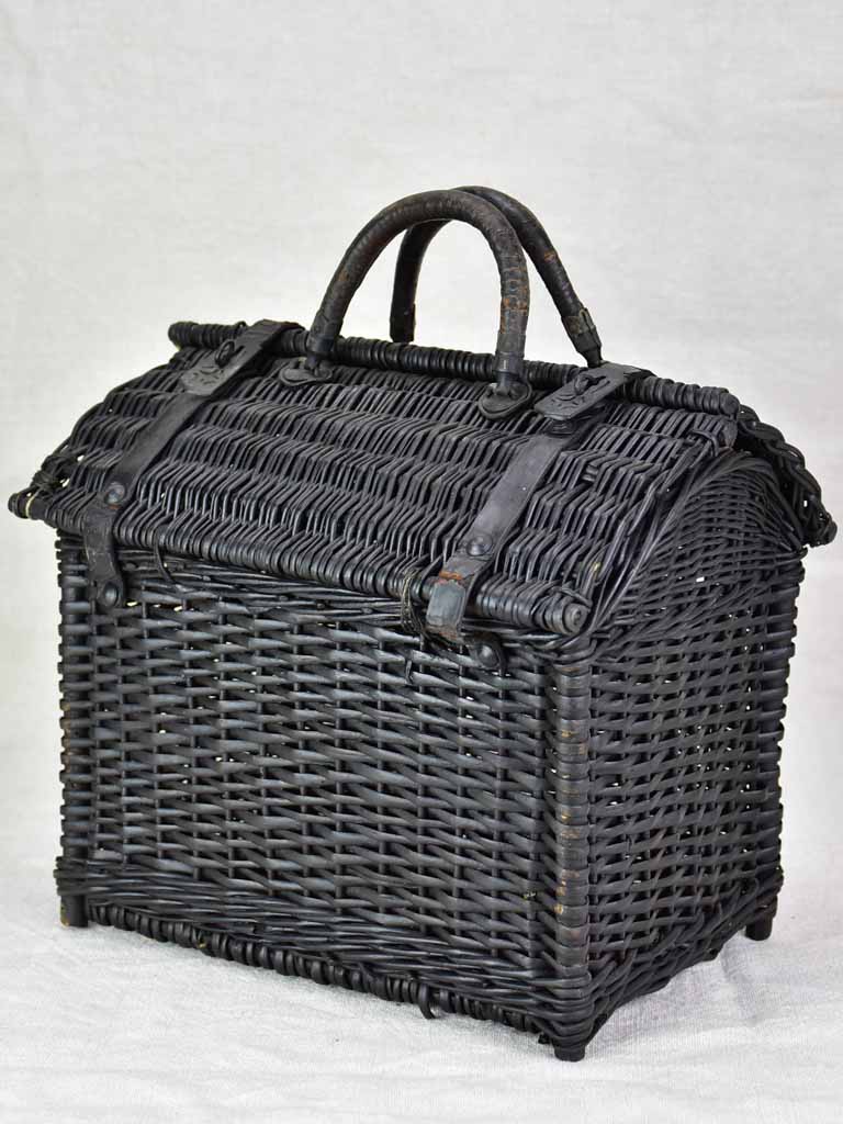Black wicker lunch basket with two handles