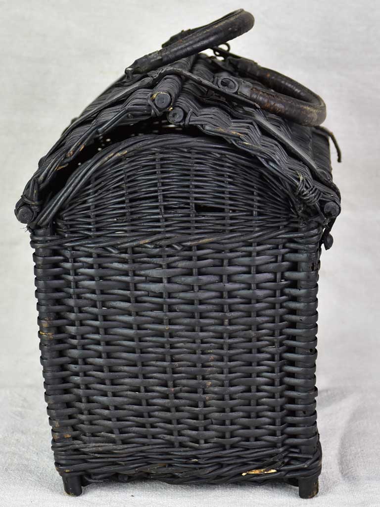 Black wicker lunch basket with two handles