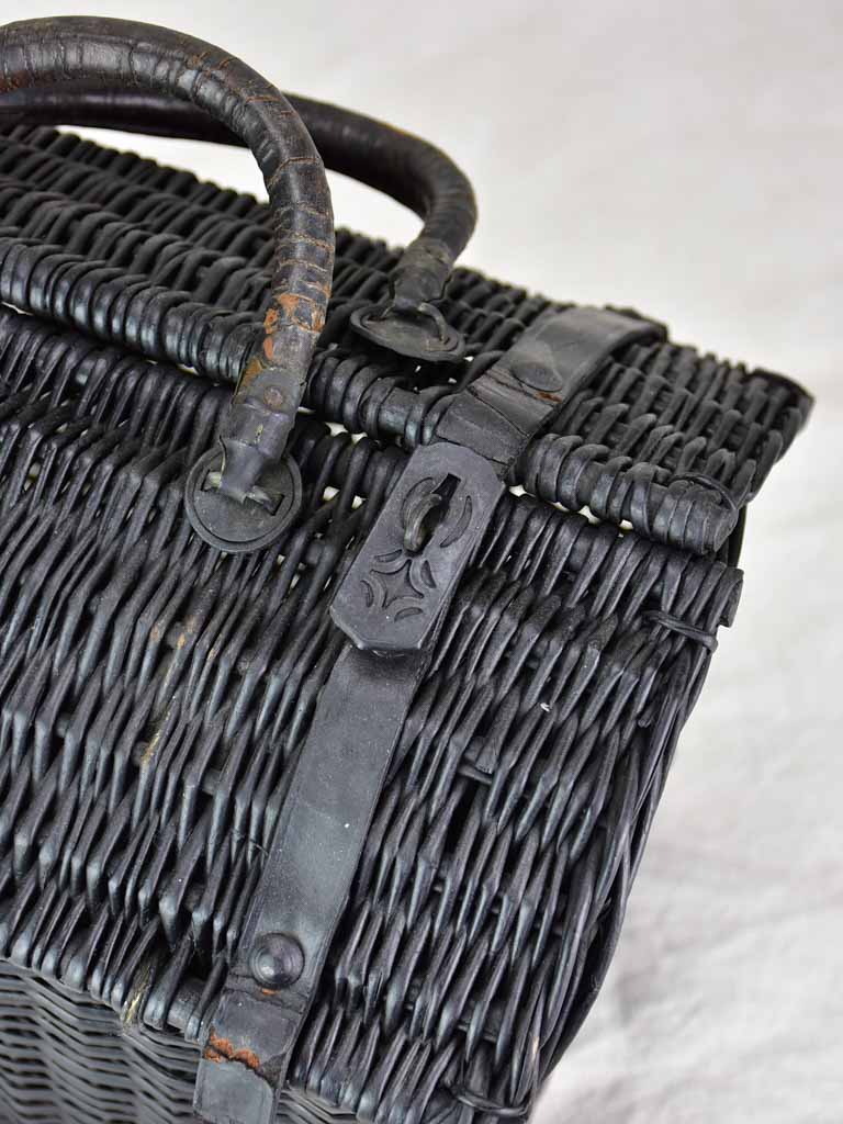 Black wicker lunch basket with two handles