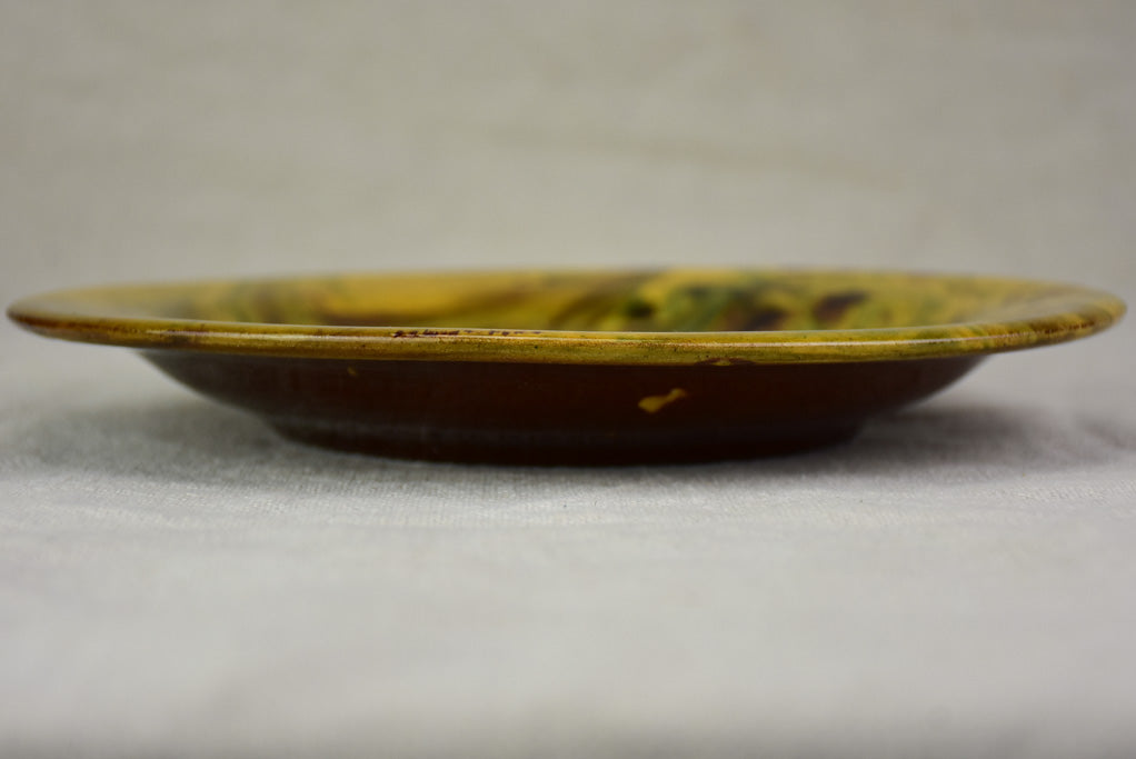 Six terracotta plates with green and yellow glaze 9½"
