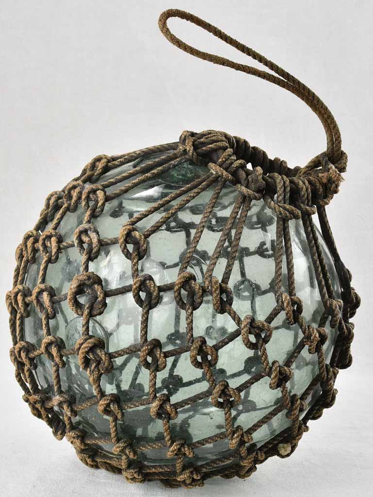 Netted glass fishing float 1930s, 12½"