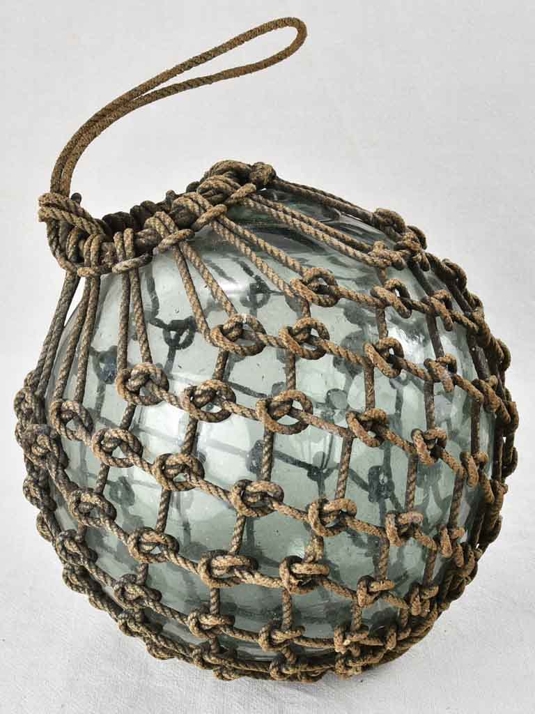 Netted glass fishing float 1930s, 12½"