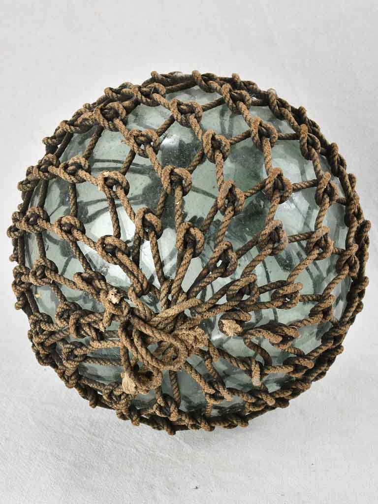 Netted glass fishing float 1930s, 12½"