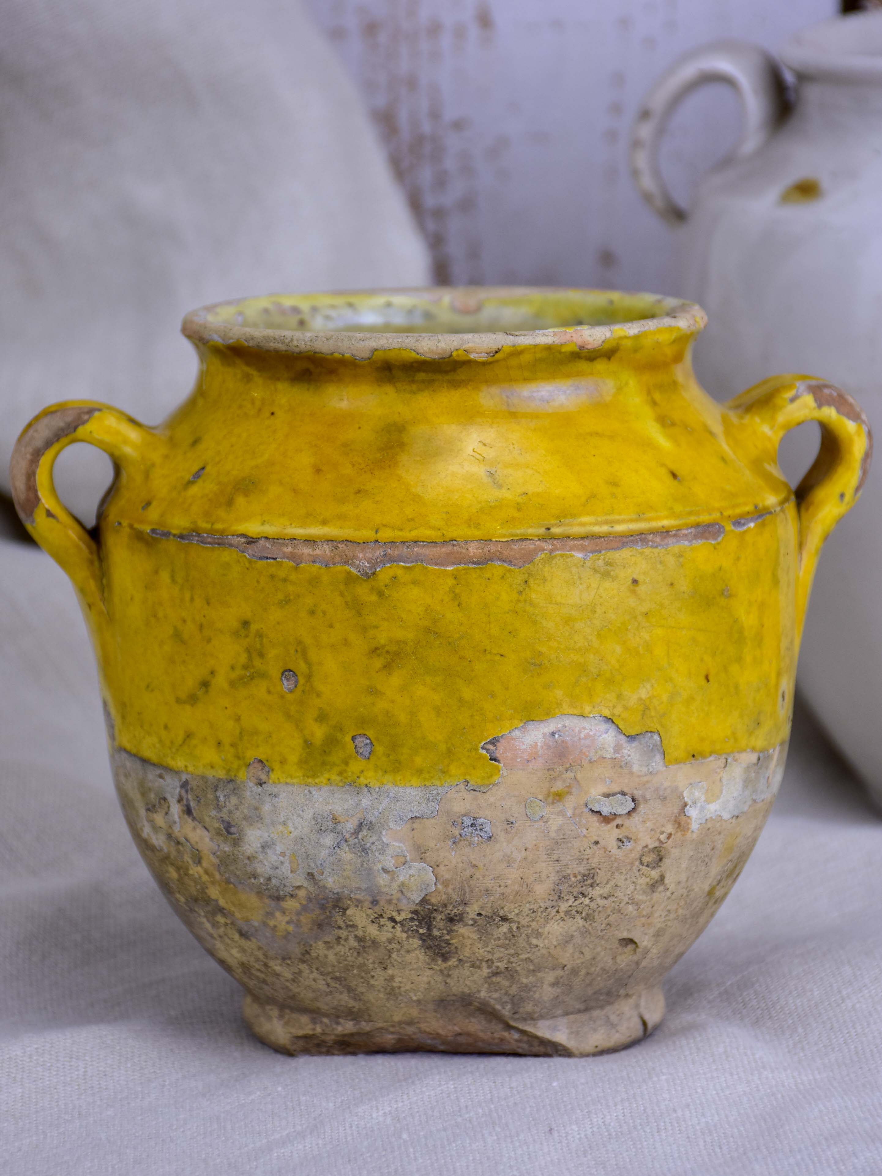 Small 19th Century French confit pot with orange glaze