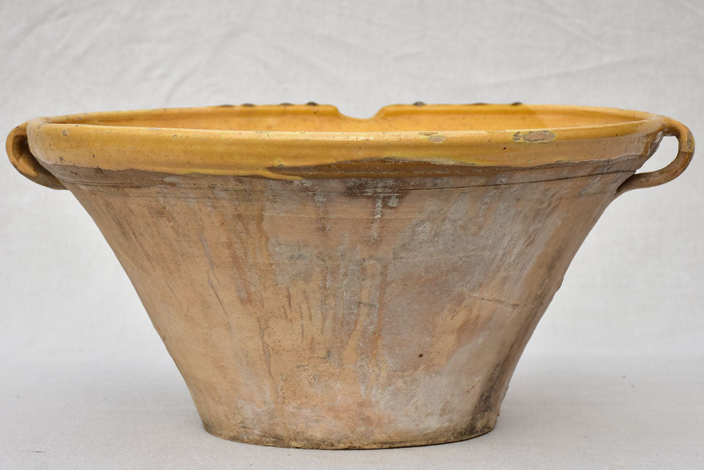Large antique French bowl / tian with yellow glaze 16½"