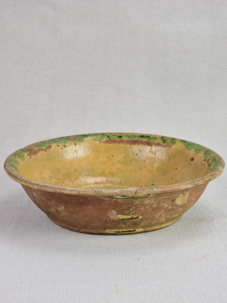 Antique French terracotta bowl with flowers with old repairs 11"