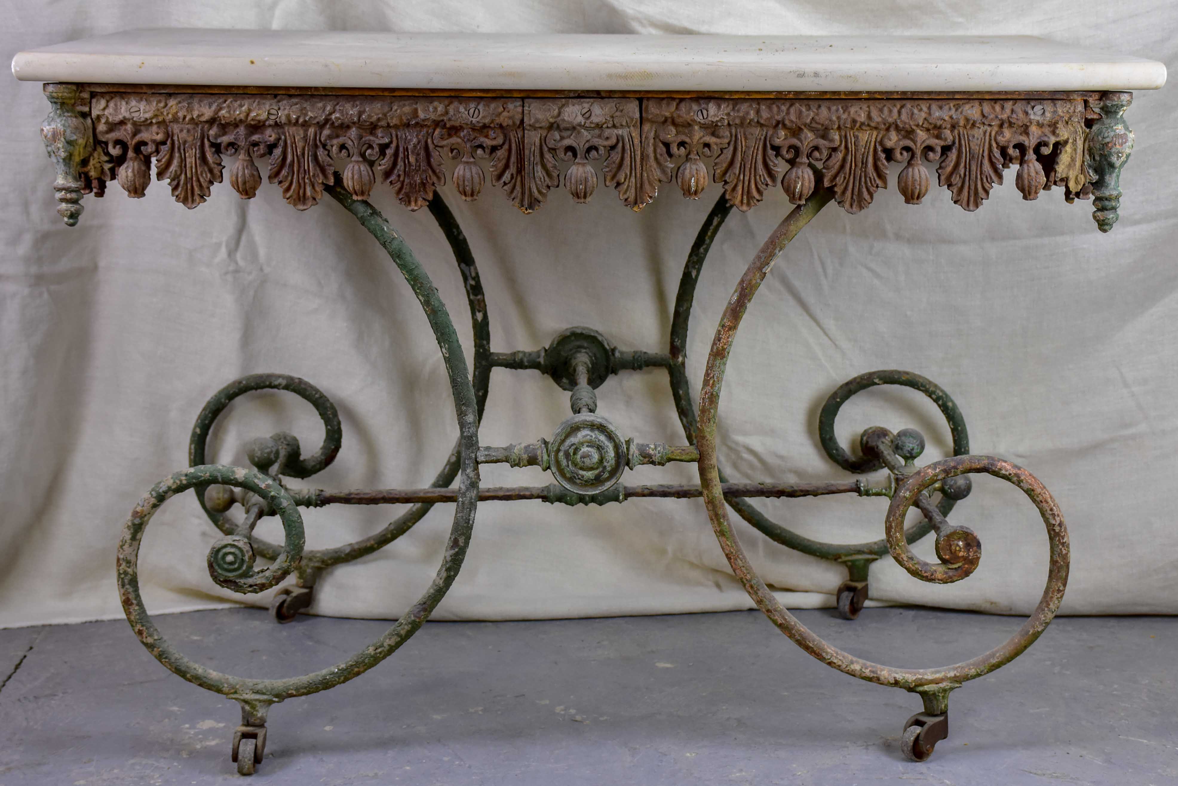 19th Century French butcher's table with marble top and wheels