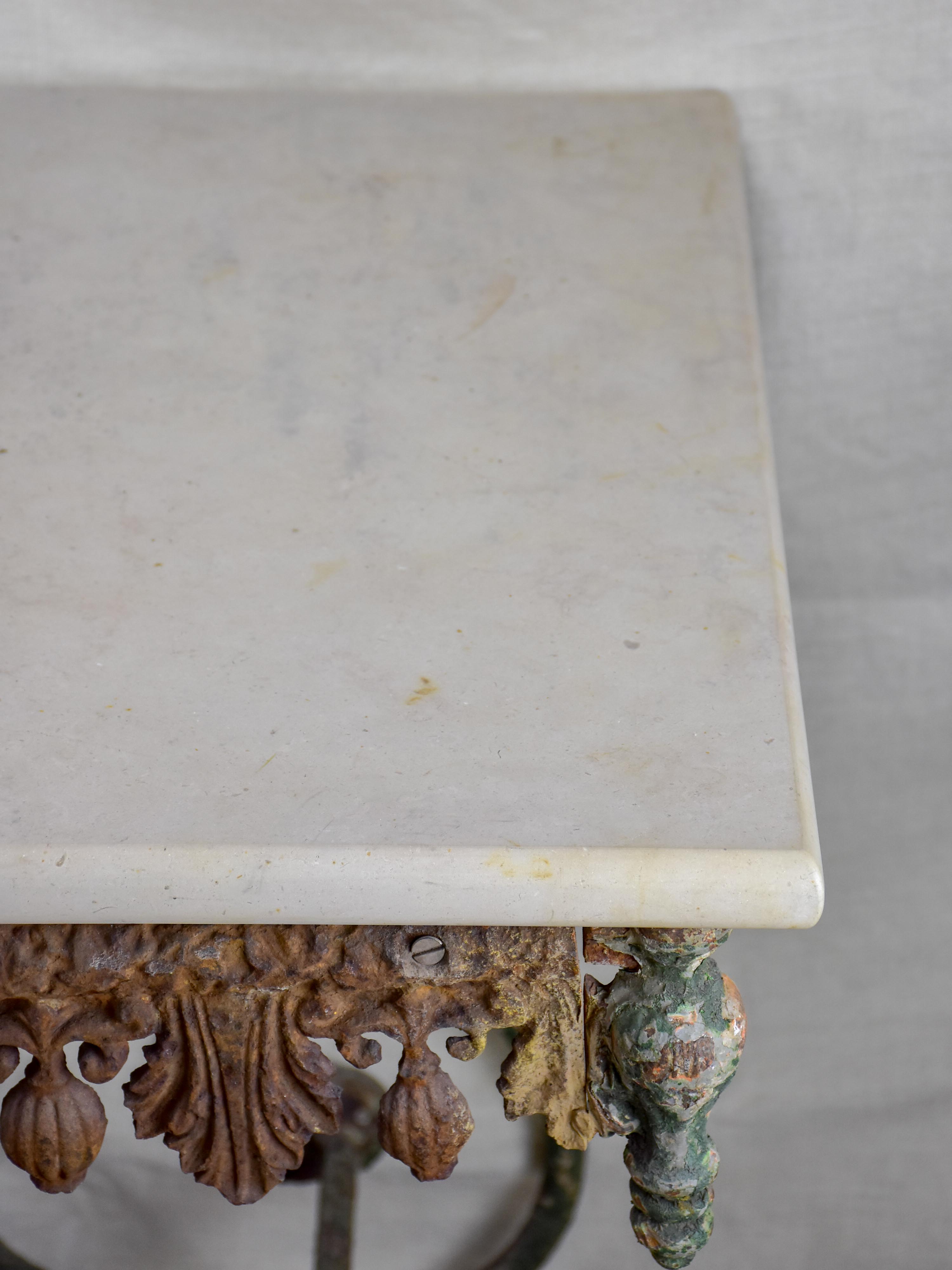 19th Century French butcher's table with marble top and wheels