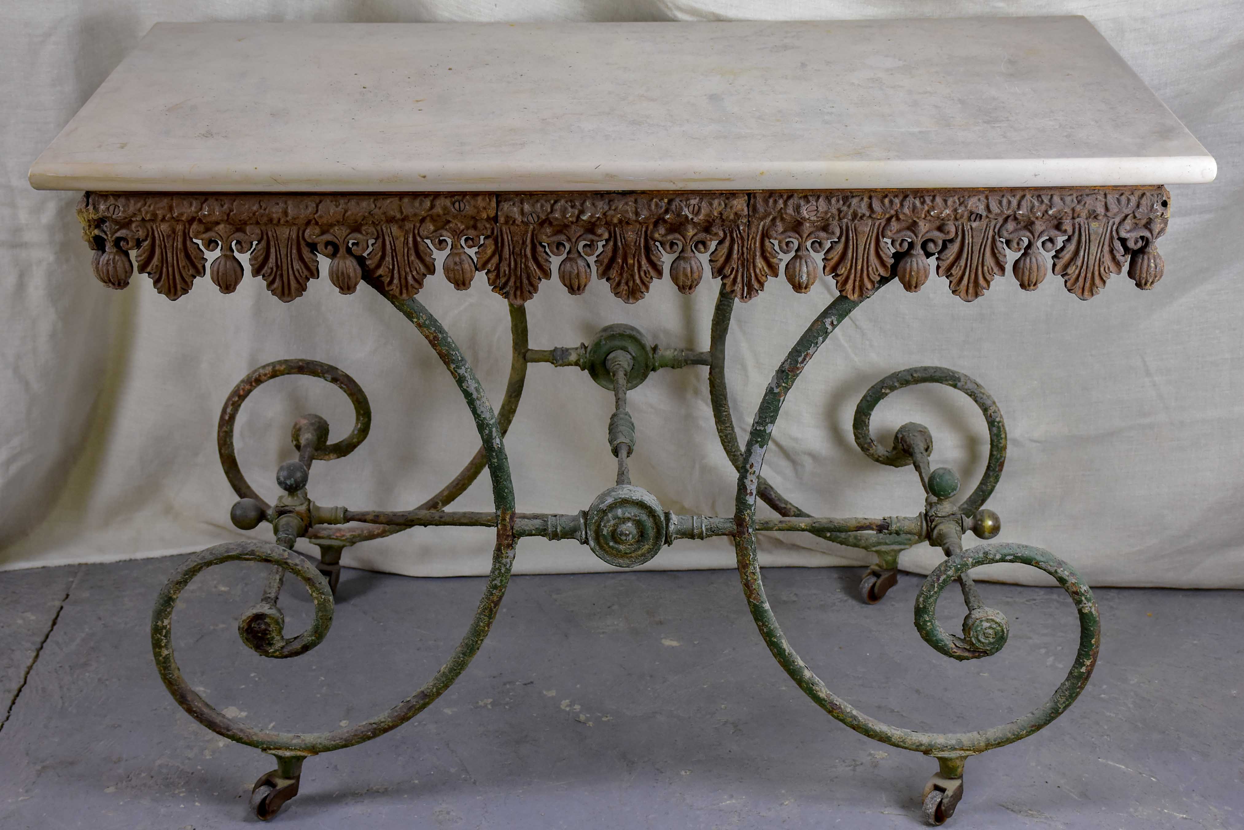 19th Century French butcher's table with marble top and wheels