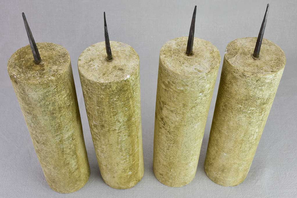 Four large stone candlesticks 16½"