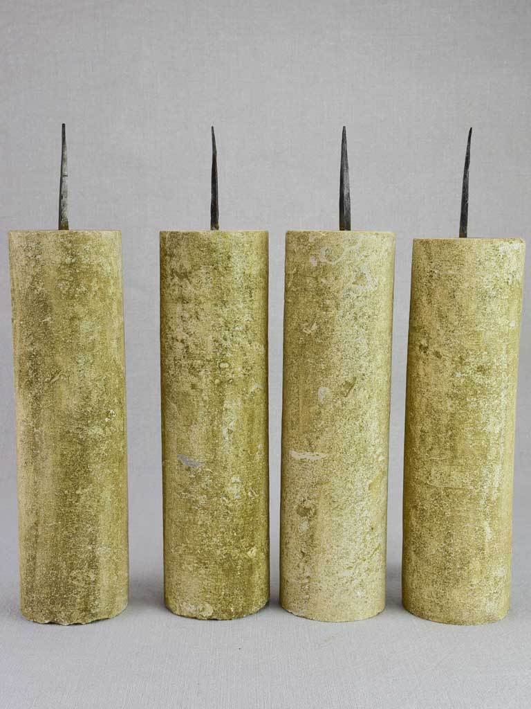 Four large stone candlesticks 16½"