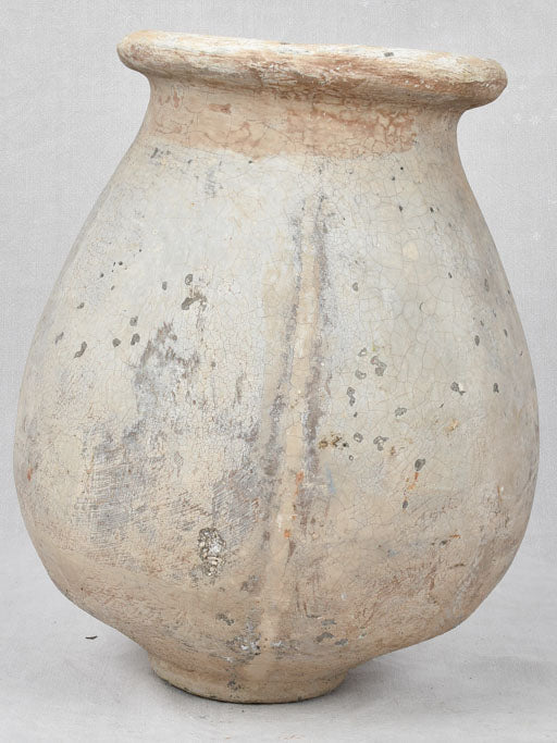 Vintage olive jar with beige patina