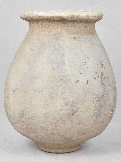 Thick cement 1940s olive jar