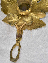 Historic vine-leaf style bronze candleholder