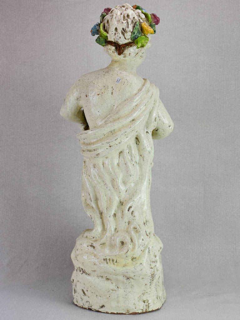 Mid century faience Putto with colorful flowers 26"