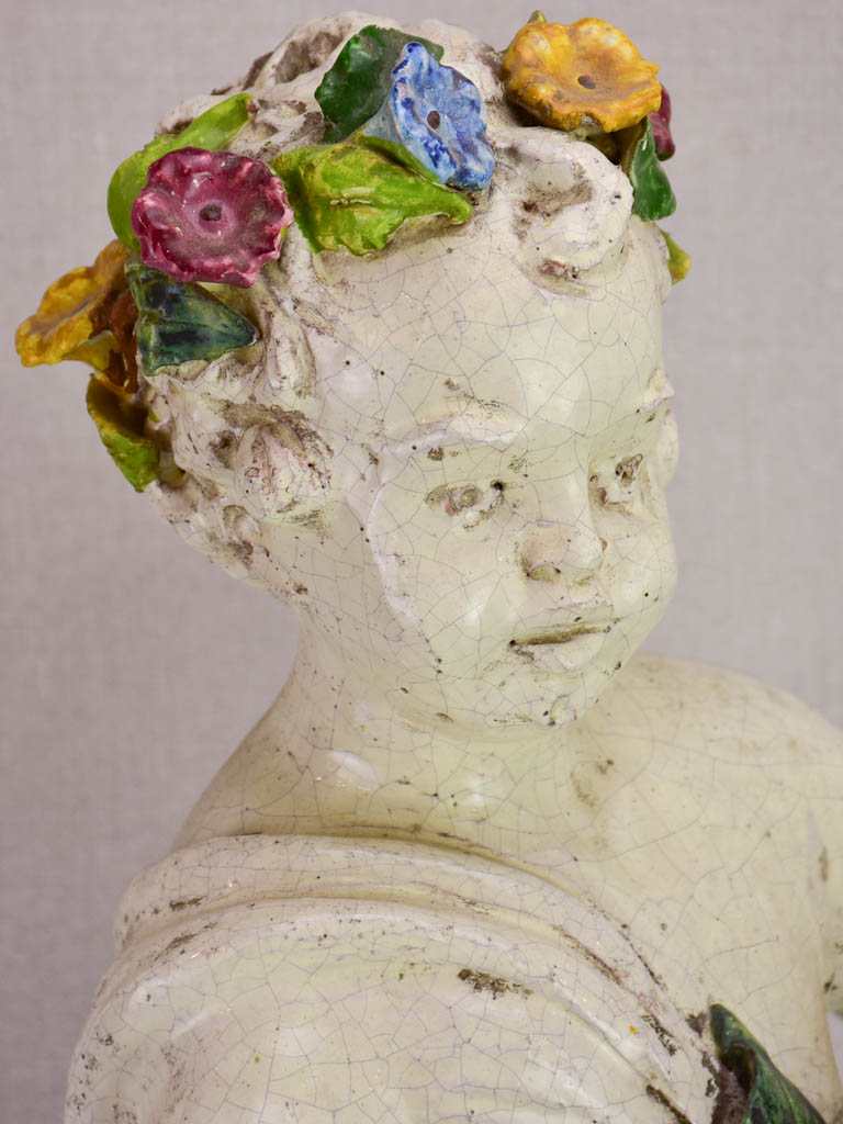 Mid century faience Putto with colorful flowers 26"