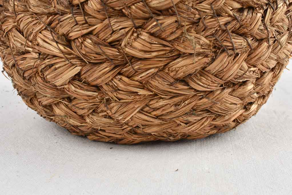 Medium demijohn bottle in woven straw basket 12½"