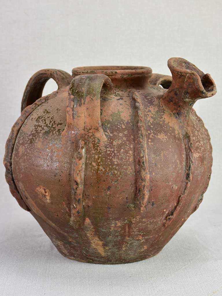 Large walnut oil pitcher from the early twentieth century 11½"