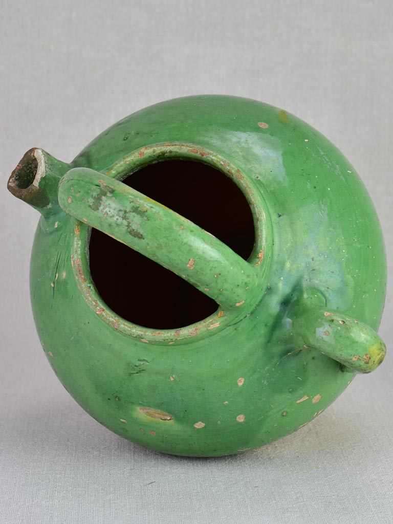 Early twentieth century French water pitcher with green glaze 11½"