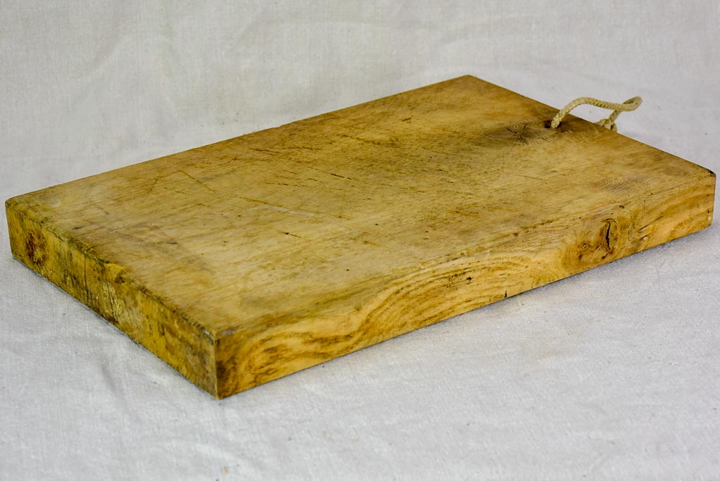 Antique French cutting board with rope handle 13¾" x 17¾"