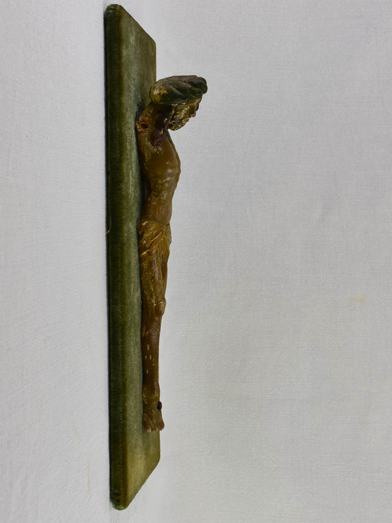 18th Century carved statue of Christ on green velour 21¼" x 8"