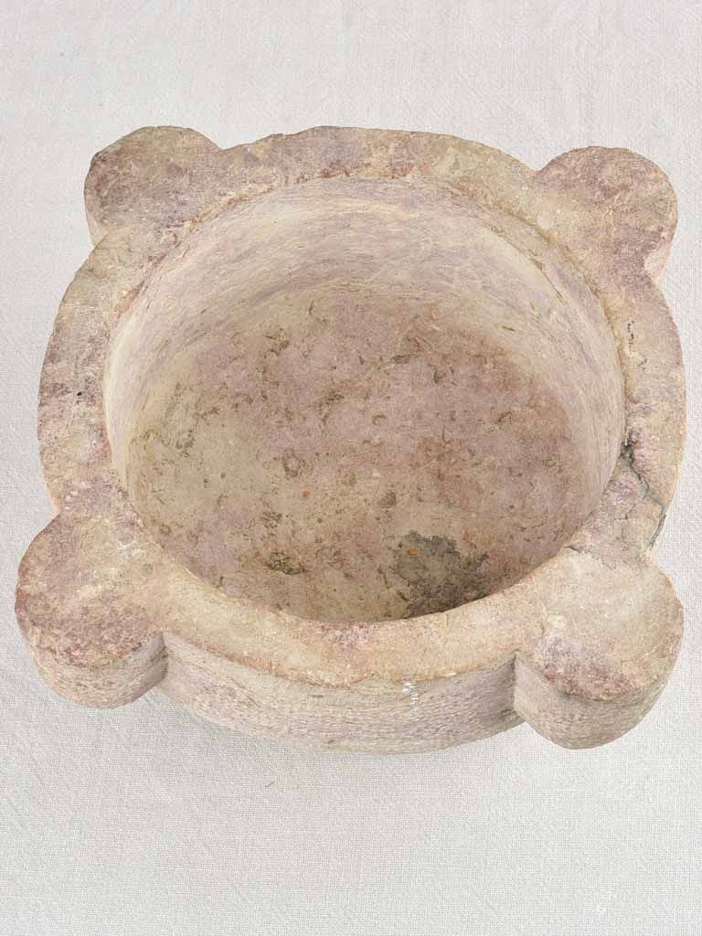 Antique stone mortar with brown / purple patina