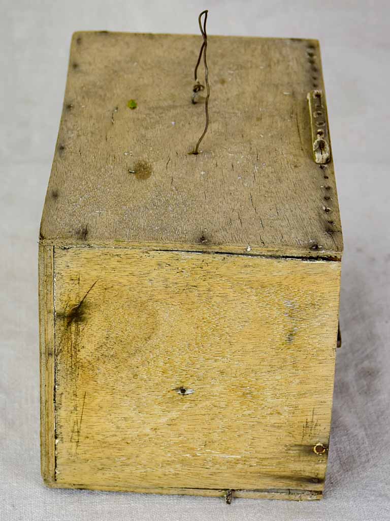 Small 1920's birdcage with nest and water