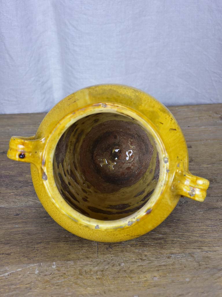 Timeworn antique French confit pot with yellow glaze 10¾"
