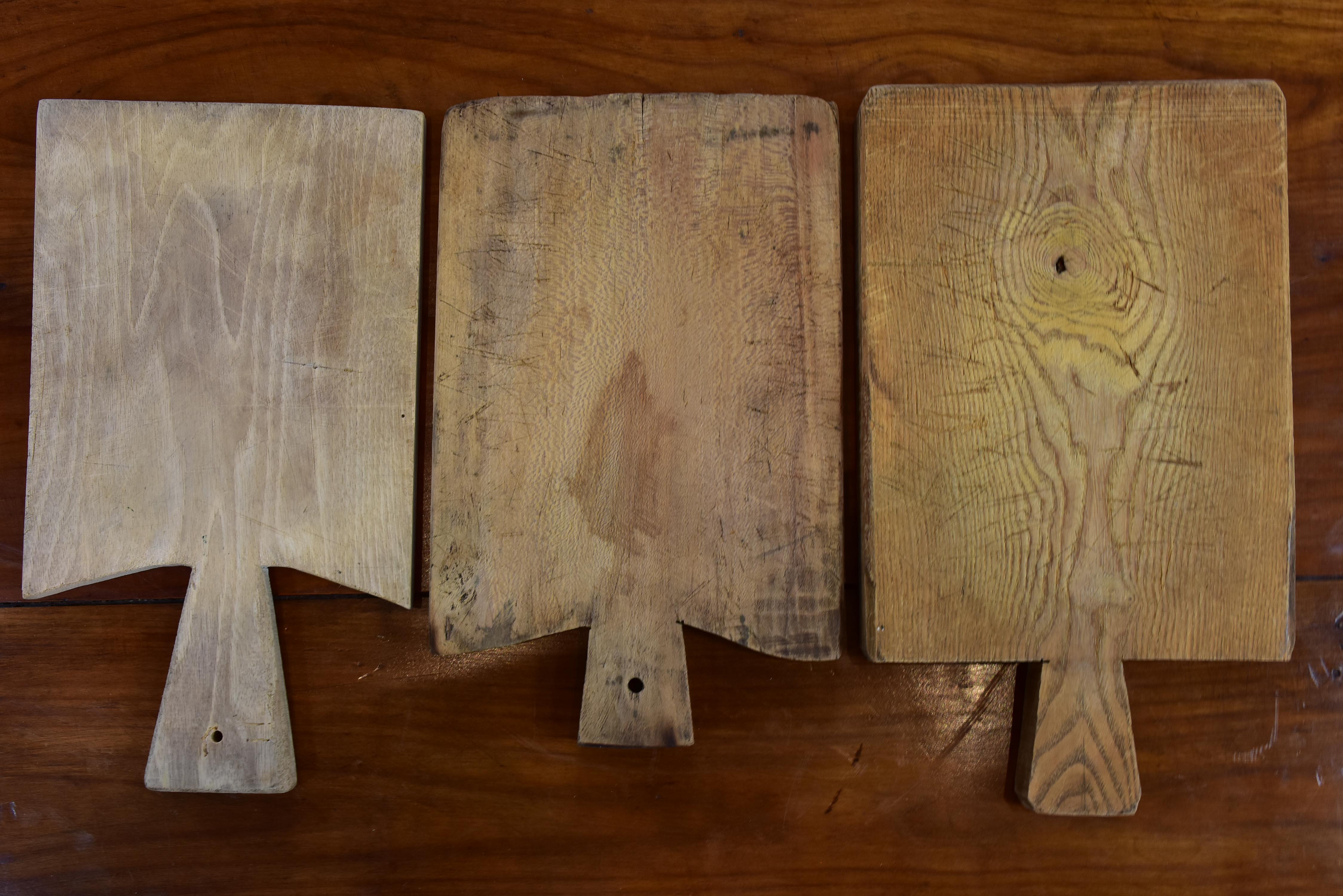 Three rustic French cutting boards