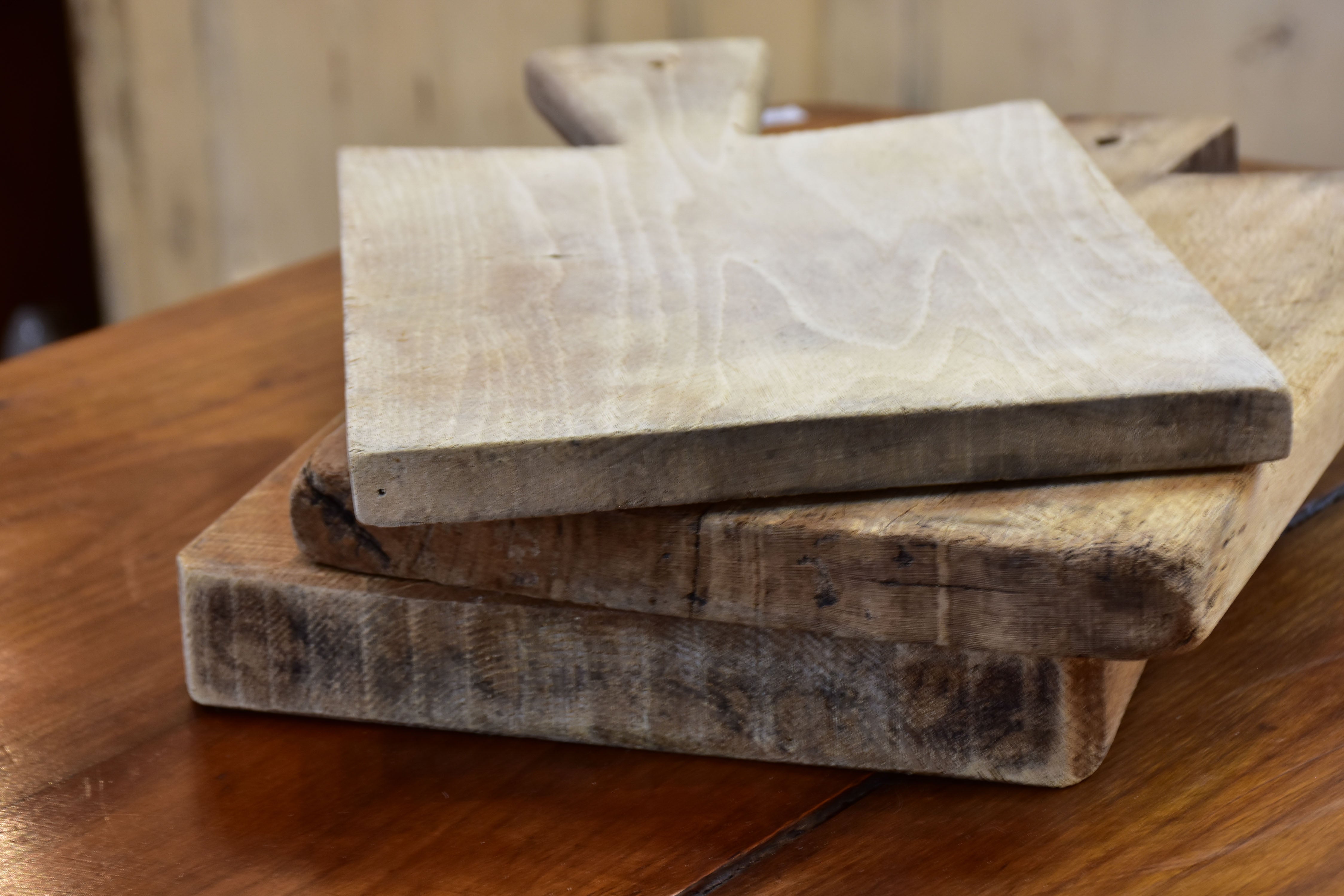 Three rustic French cutting boards
