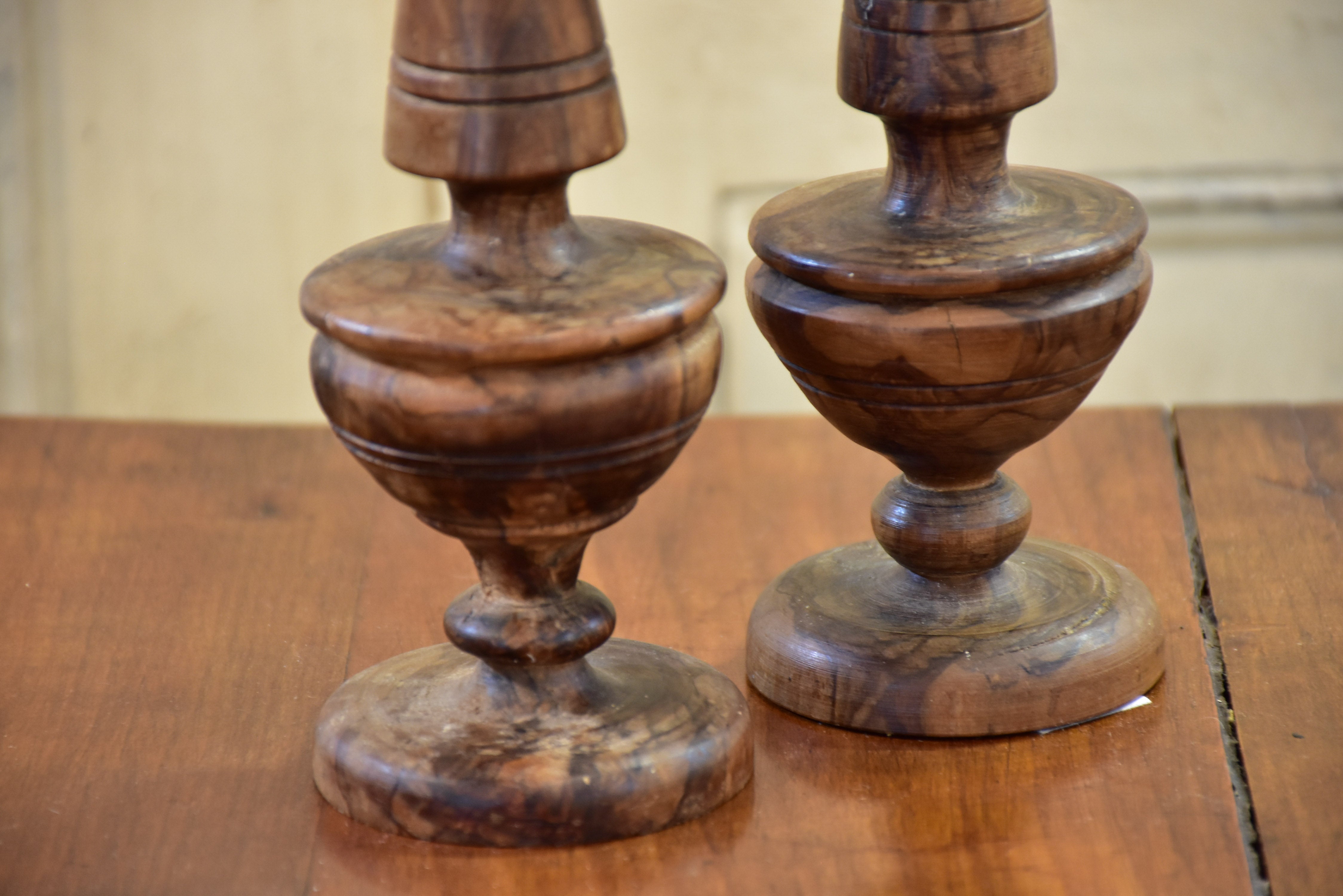 Pair of antique olivewood candlesticks