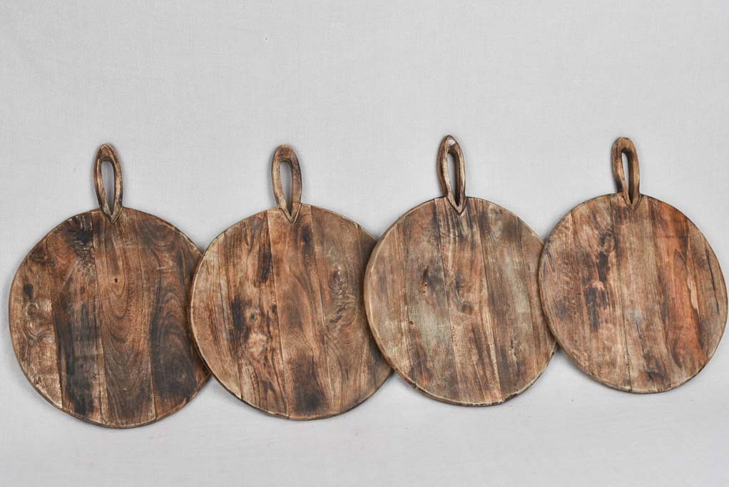 Collection of four round cutting boards 14½"