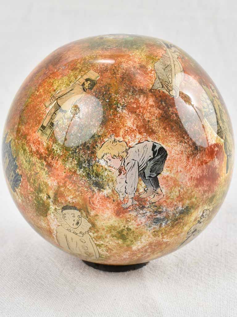 Antique French blown glass wig display decorated with villagers 6"