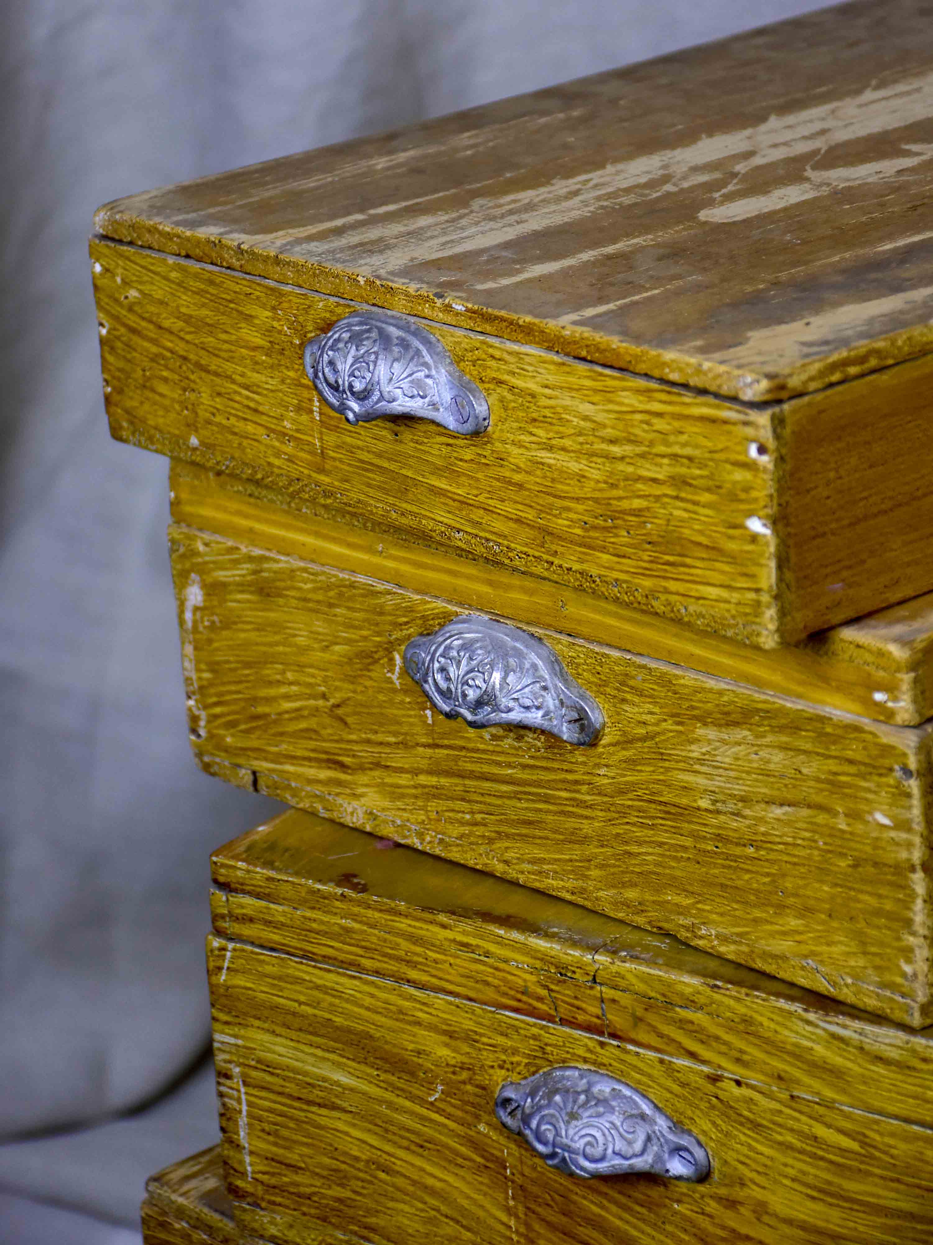Set of twelve antique French boxes from a glove shop