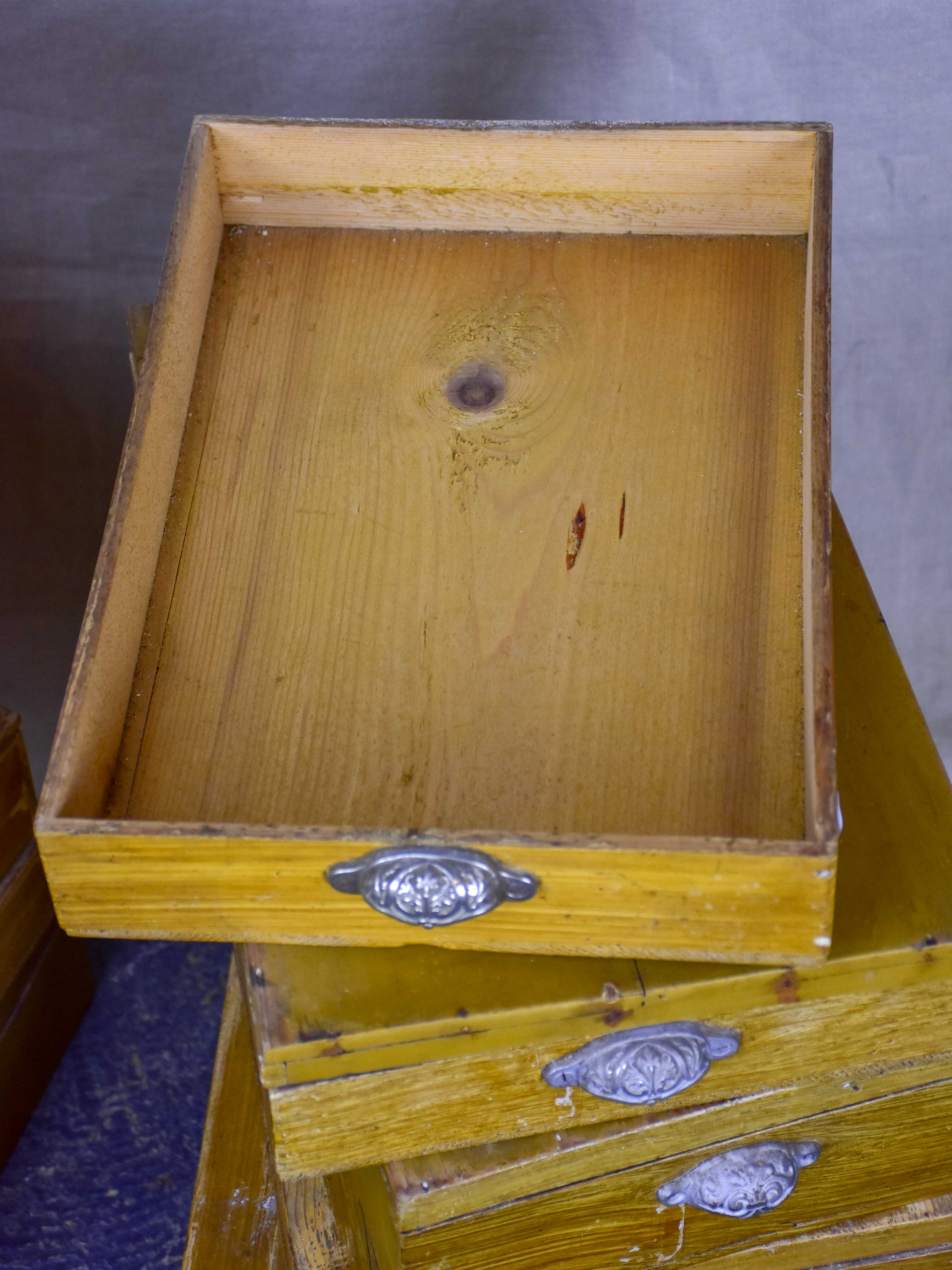 Set of twelve antique French boxes from a glove shop