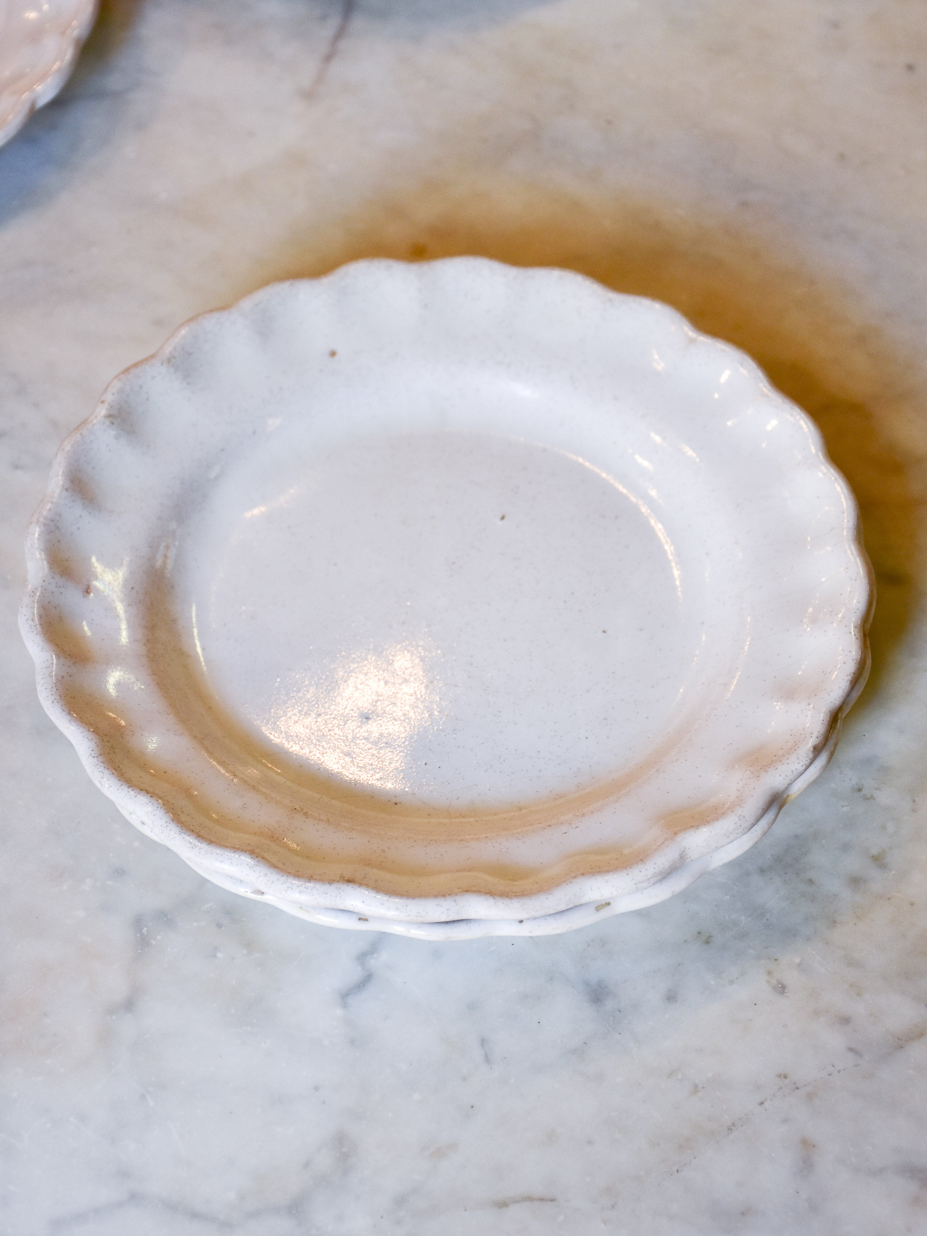 Collection of 7 antique French ironstone plates with rippled edge