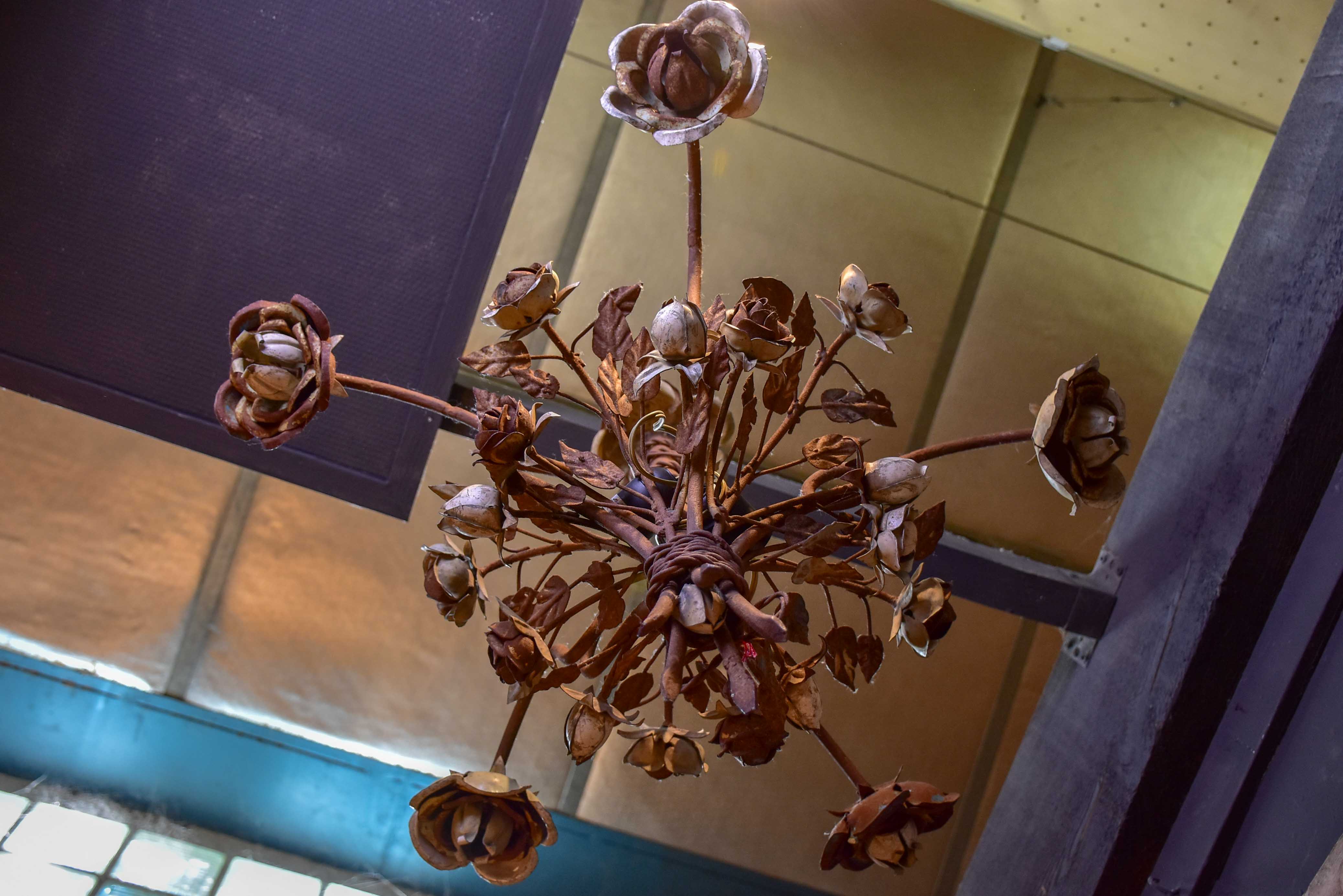 Antique French wrought iron and tole pendant with flowers