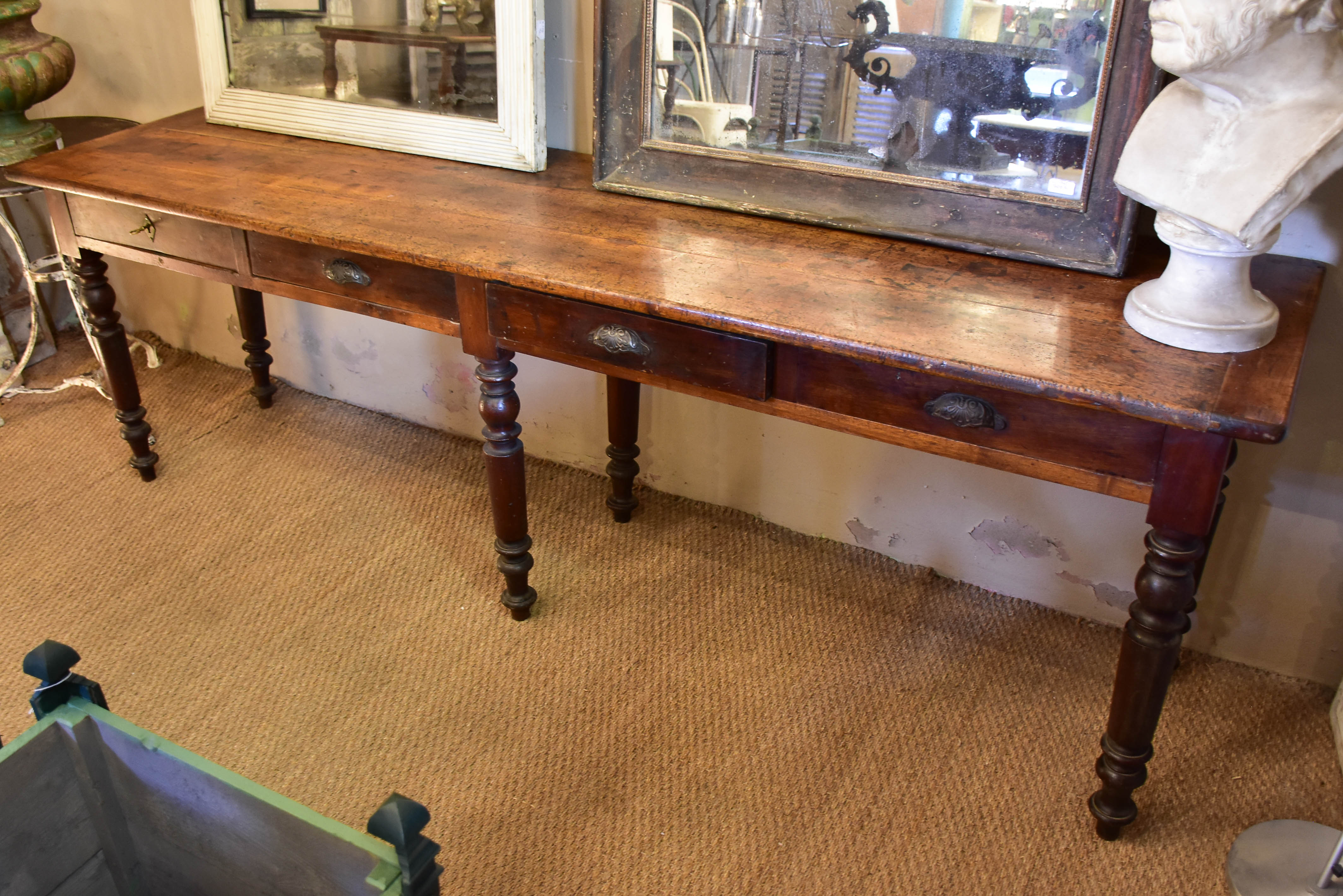 Large antique French console table from a boutique