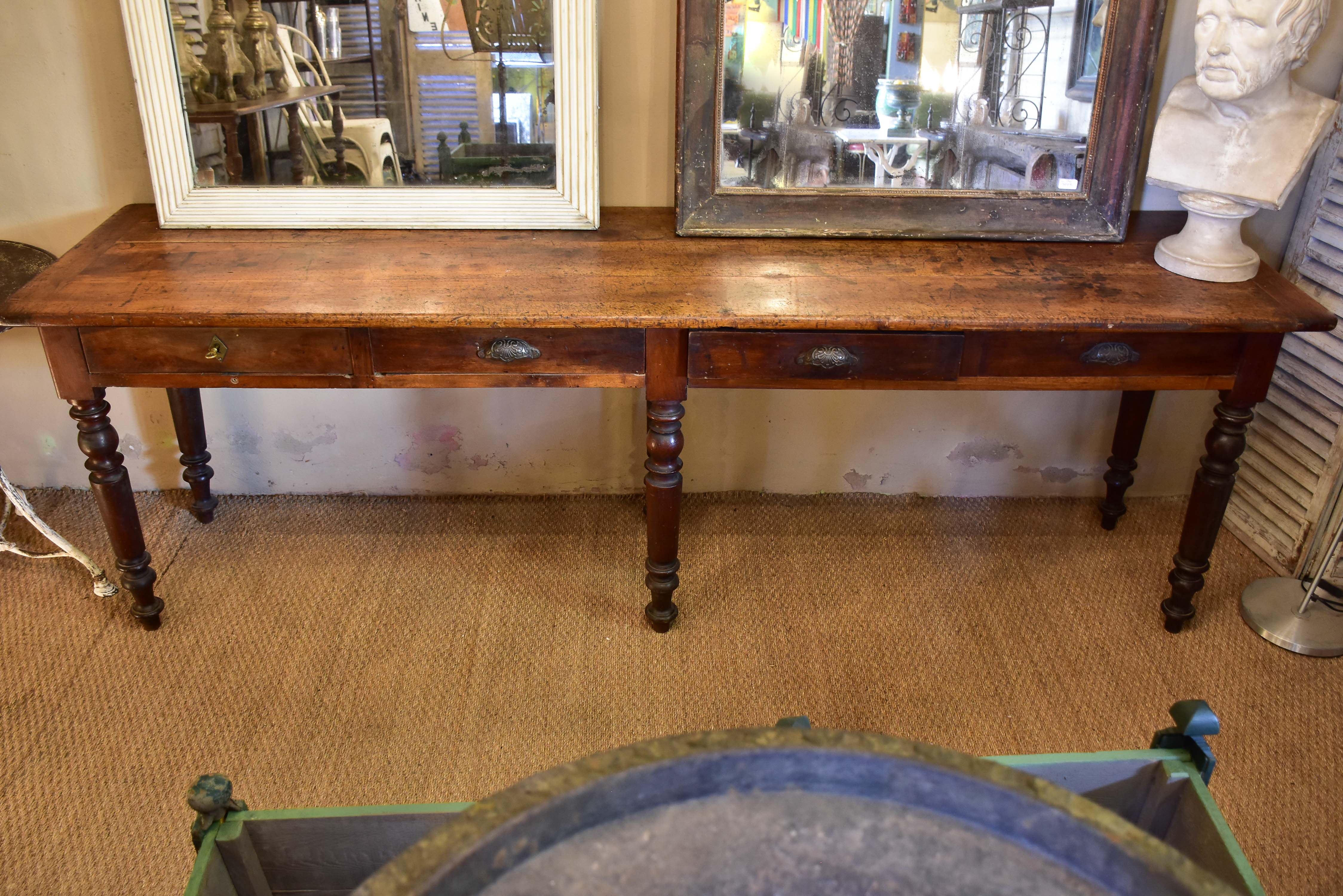 Large antique French console table from a boutique