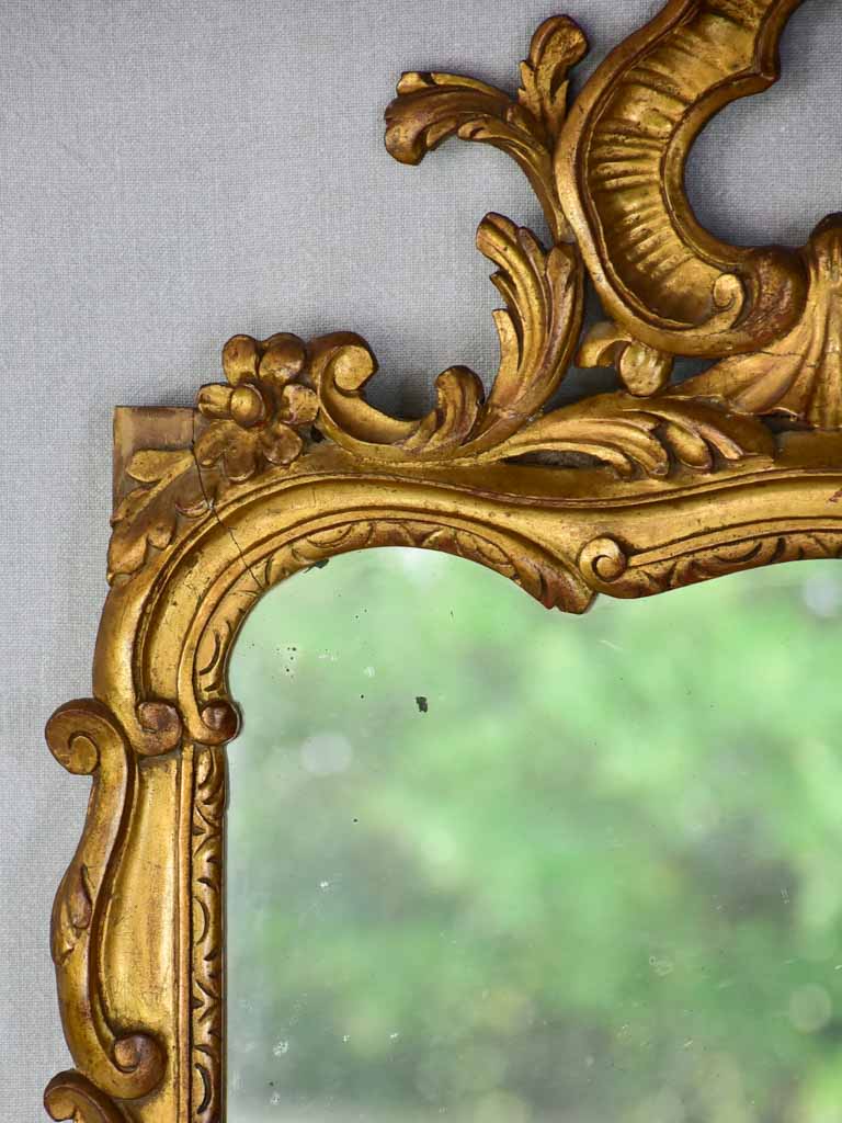 Late 19th-century Louis XV style gilt mirror with pediment 23¼" x 37¾"