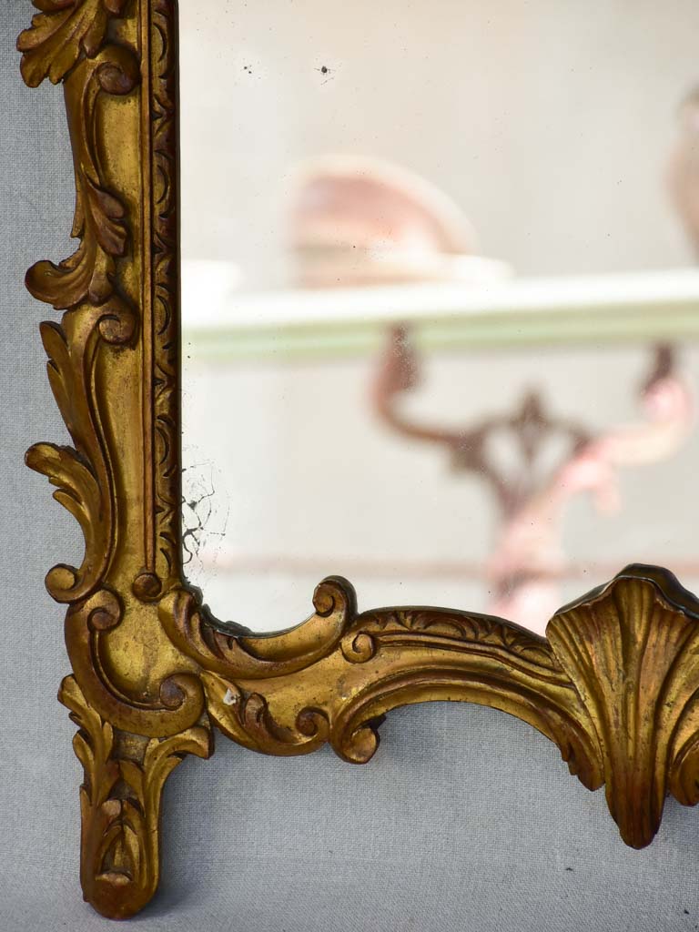 Late 19th-century Louis XV style gilt mirror with pediment 23¼" x 37¾"