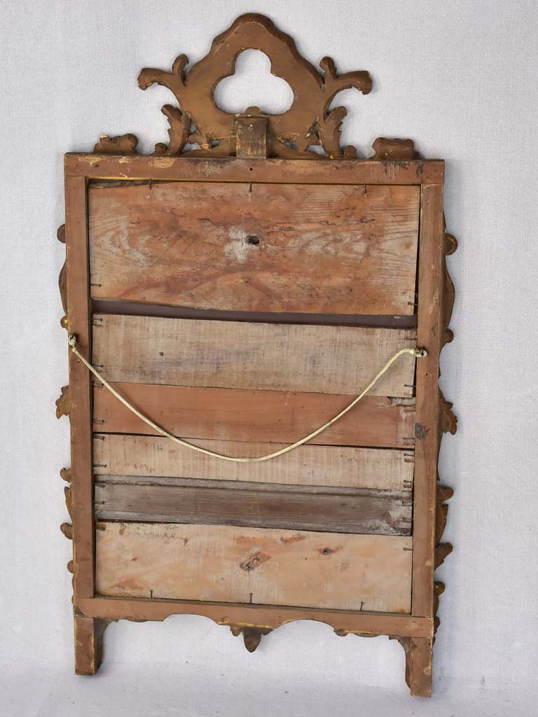 Late 19th-century Louis XV style gilt mirror with pediment 23¼" x 37¾"