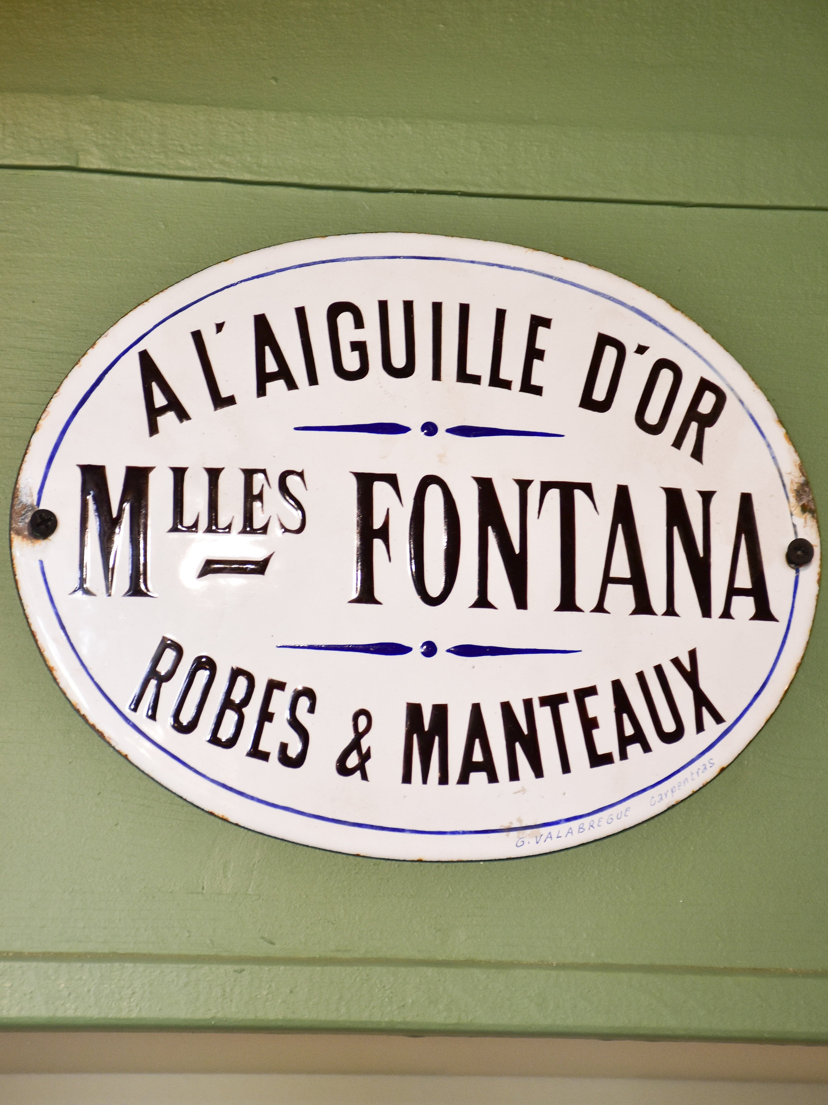 Antique French enamel sign - women's clothing boutique