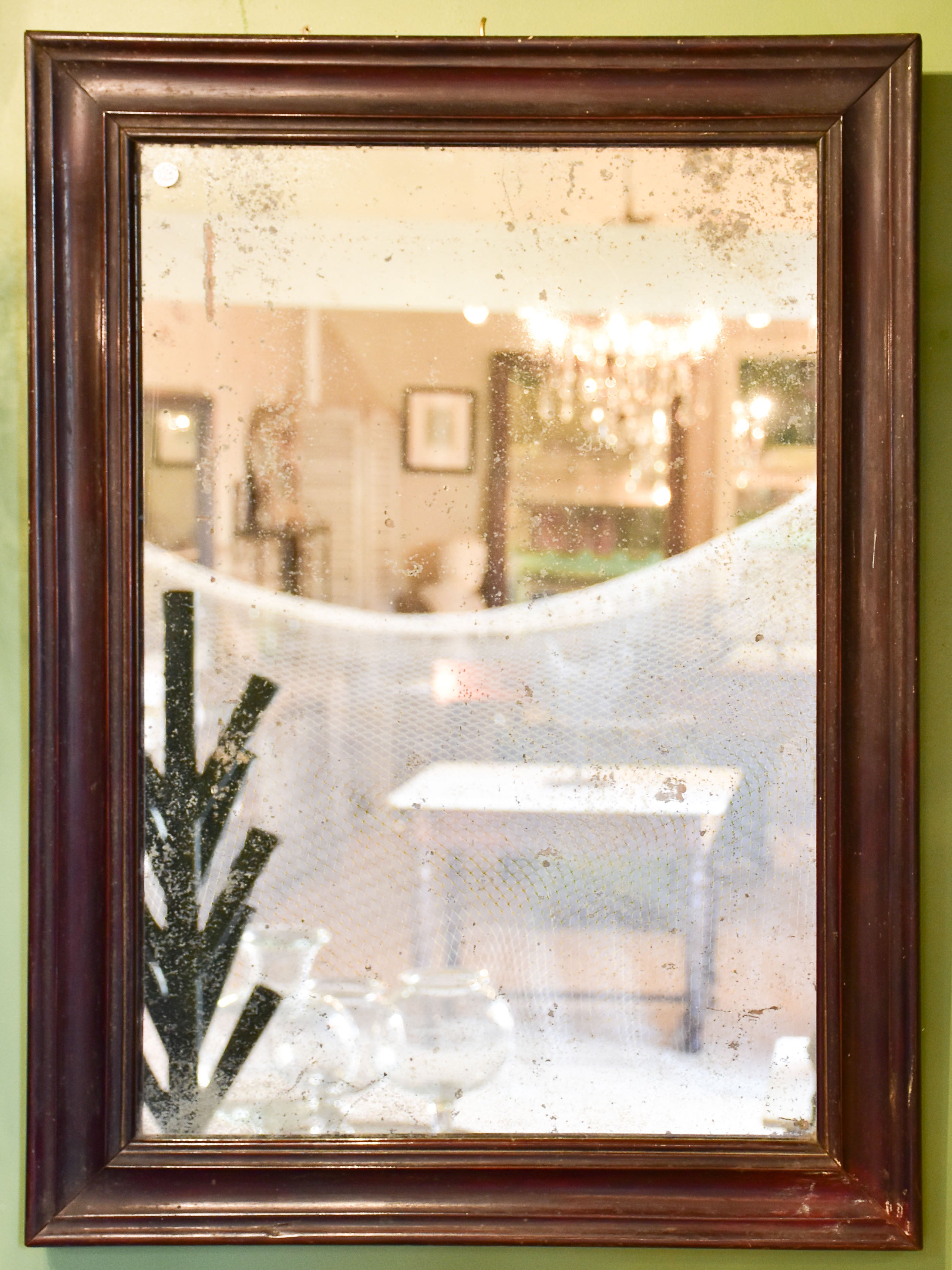 Late 19th century French mirror with black frame