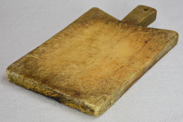Small antique French cutting board with peaked shoulders 15¾" x 9½"