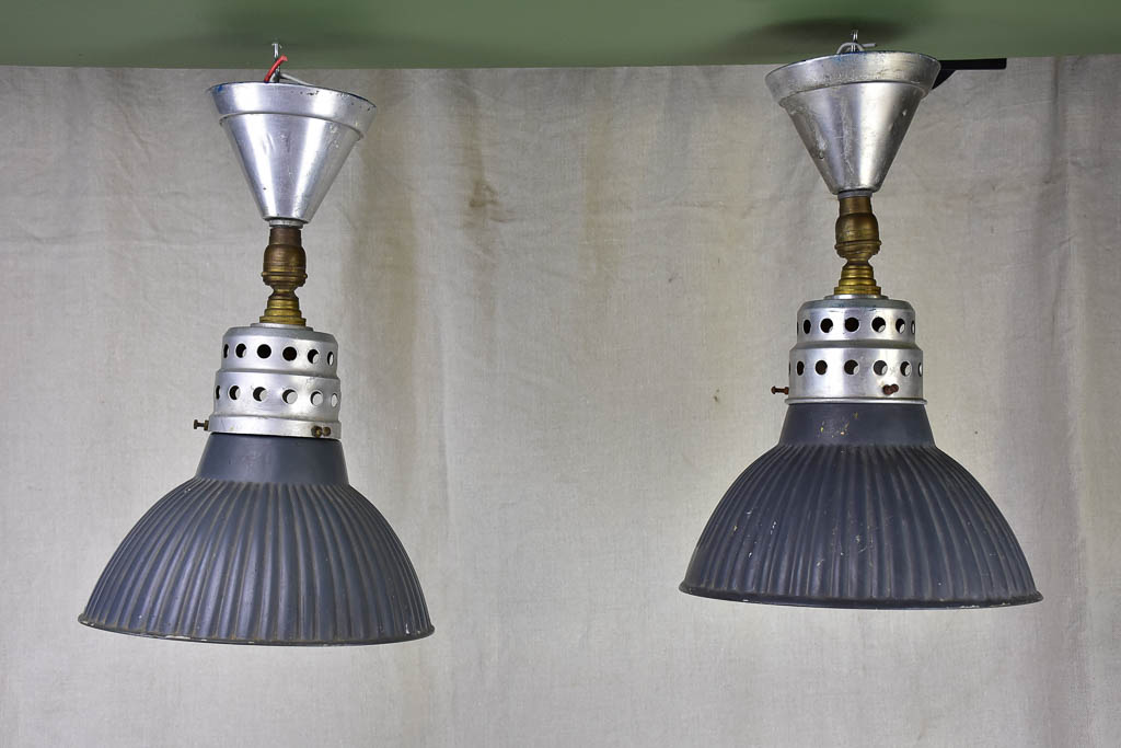 Pair of antique Holophane industrial pendant lights