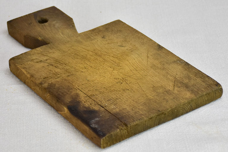 Petite antique French cutting board with broad handle 14½" x 8¾"
